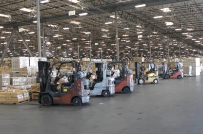 Long Shot of STG's Warehouse with forklifts ready to provide enhanced warehousing services.