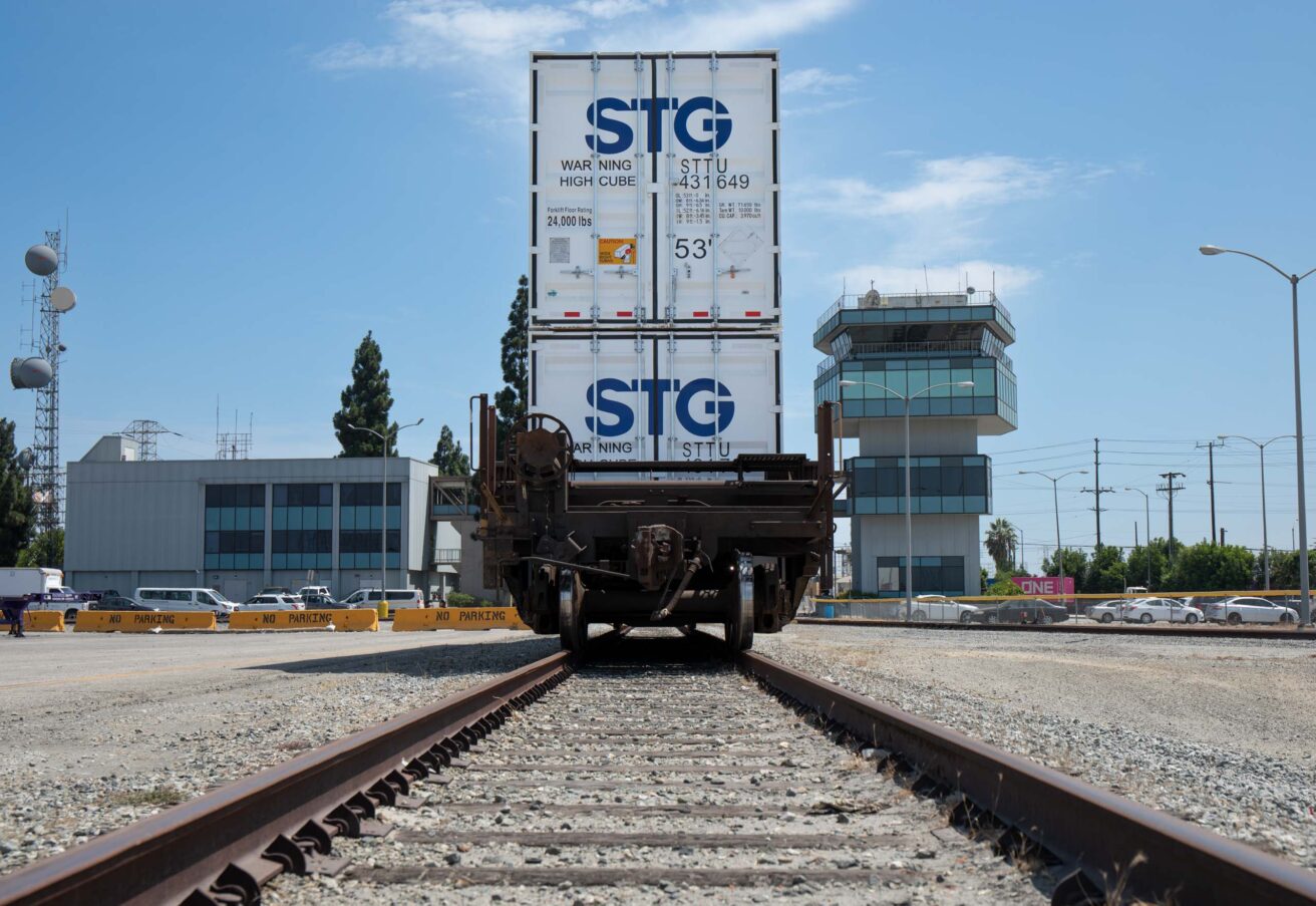 Back of a train with trailers.