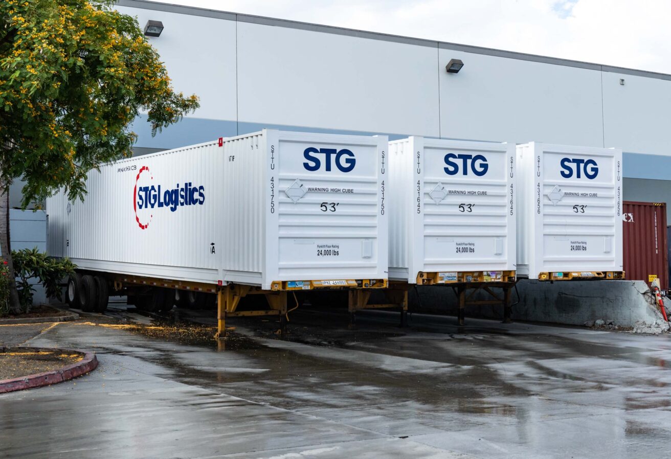 Trucks in at a warehouse.