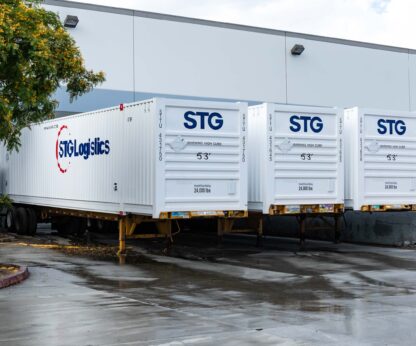 Trucks in at a warehouse.