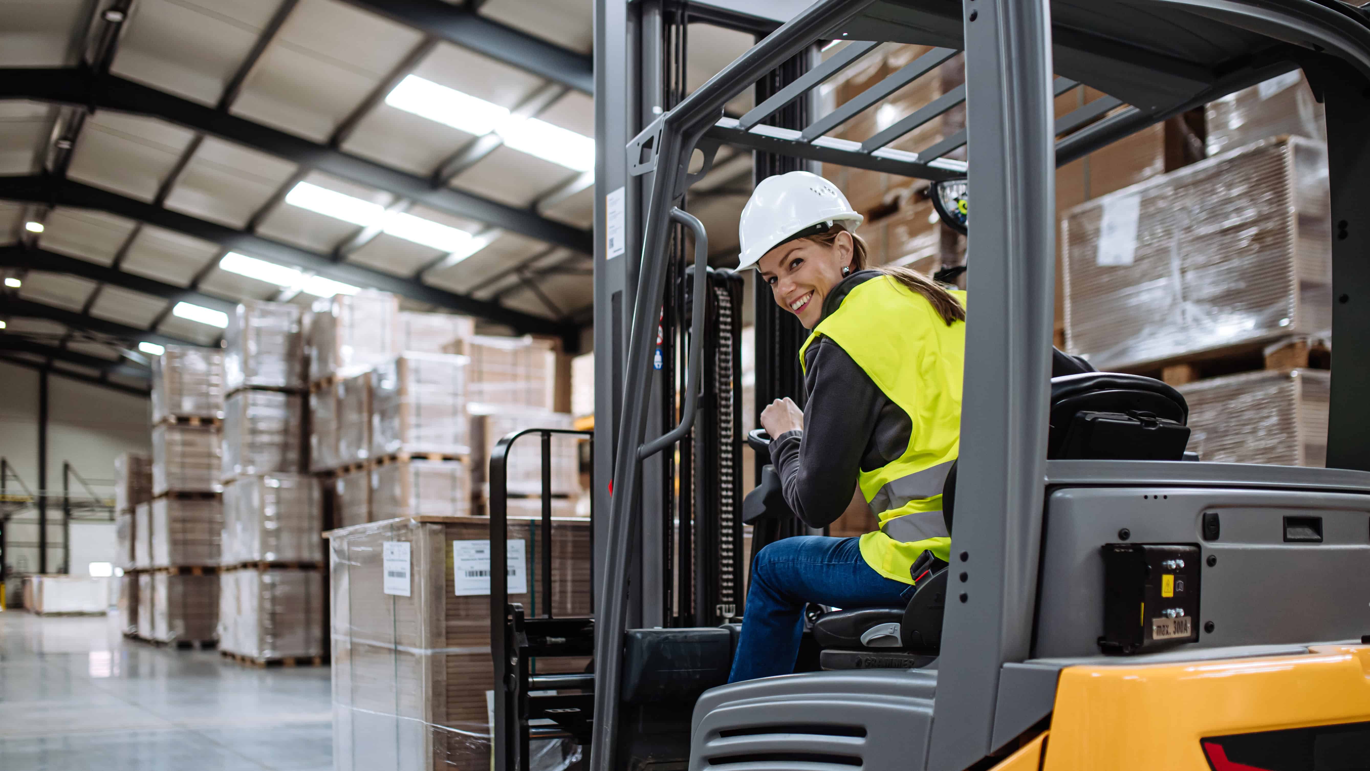 Warehouse worker preparing cargo for shipment.