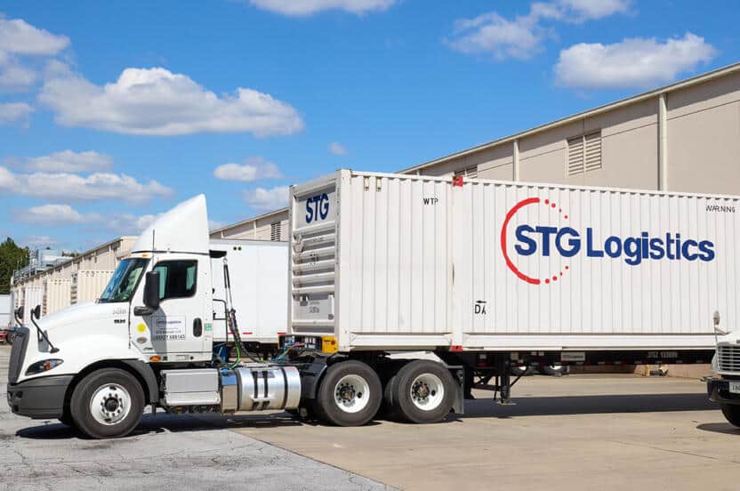 Cargo truck backed up to container freight station